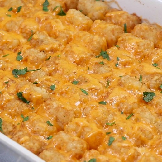 Tater Tot Casserole - A classic comfort food casserole your family will love! It has a layer of ground beef mixed with a creamy veggie sauce and topped with crispy Tater Tots and melted cheddar cheese. Get the printable recipe: https://www.simplystacie.net/2018/10/tater-tot-casserole/ | Simply Stacie
