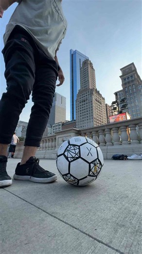 Urban Freestyle Soccer Skills in the Cityscape