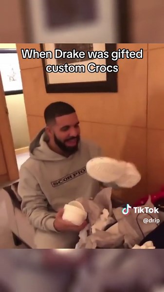 Throwback to when Drake was gifted a pair of custom Crocs 😭💧 Do y’all get this hyped over Crocs ⁉️ #drake #drizzy #drakememes #crocs #crocsoriginal #crocsgang #rap #draketok #forallthedogs #sneakerhead #sneakercommunity