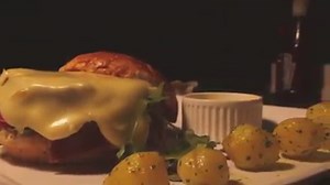 Life is too short to miss out on this amazing and beautiful raclette burger! Try this out for lunch or dinner. | Grotto Cafe