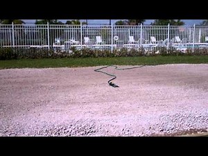 BOCCE BALL COURT CONSTRUCTION PROCESS: Preliminary Phase 4 - Watering the Graded Rock Base