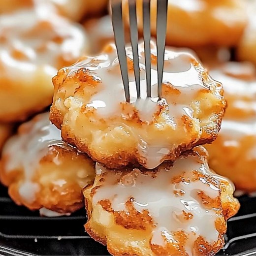 Baked Apple Fritters These baked apple fritters are simple to make and bursting with delicious apple taste. Enjoy them warm for a delightful treat that everyone will enjoy! Ingredients: 1. 2 cups all-purpose flour 2. 1/3 cup granulated sugar 3. 2 teaspoons baking powder 4. 1/2 teaspoon salt 5. 1 teaspoon ground cinnamon 6. 1/2 cup milk 7. 1 large egg 8. 2 tablespoons unsalted butter, melted 9. 1 cup peeled and diced apples 10. 1/2 cup powdered sugar (for glaze) 11. 2 tablespoons milk (for glaze)