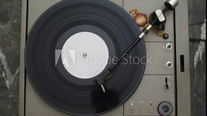 Stop turntable of the plate at 33 rpm and automatic return of the arm