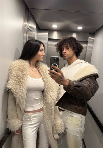 Elevator Mood: Stylish Couple Vibes and Outfit Check