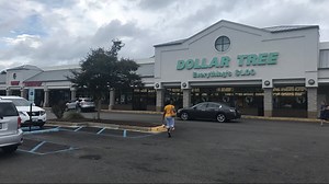 Woman seriously injured after being run over in parking lot outside Dollar Tree