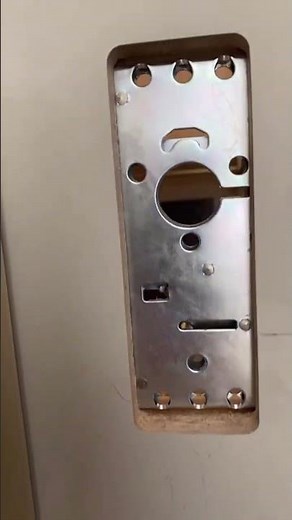 Prepping and installing pocket door hardware.
