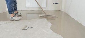 How to Level Concrete Flooring | DoItYourself.com