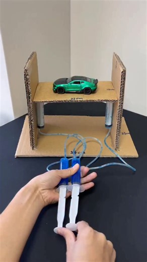 paper crafts creator on Instagram: "DIY Hydraulic Car Lift #sciencecraft #hydraulicDIY #kidscraftideas #fblifestyle"