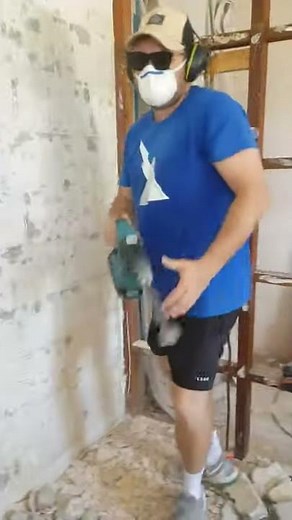 Bathroom Remodeling Removing Tiles with Makita's Hammer Drill