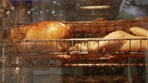Rotisserie Chicken grill in a special grill machine in supermarket