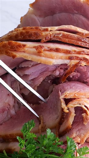 One of the easiest ways to make a Christmas Ham - in the slow cooker! Find the full recipe at SixSistersStuff.com or comment "recipe" below and we'll send you the link to your messages. | Six Sisters' Stuff