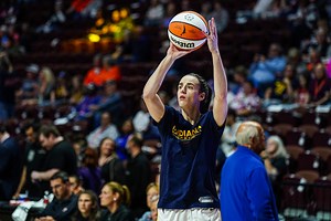 In Pictures: Caitlin Clark chooses $3100 Tiffany tote to accessorize her all black debut outfit for Fever vs Sun game