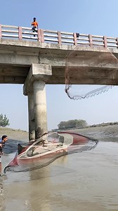Catching fish with a cast net from the bridge.. #viral #fishing #village #river | E M Rubel Islam