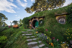 Experience the real Middle-earth with a visit to Hobbiton Movie Set. Step into the lush pastures of the Shire, as featured in The Lord of the Rings and The Hobbit trilogies. | Hobbiton Movie Set