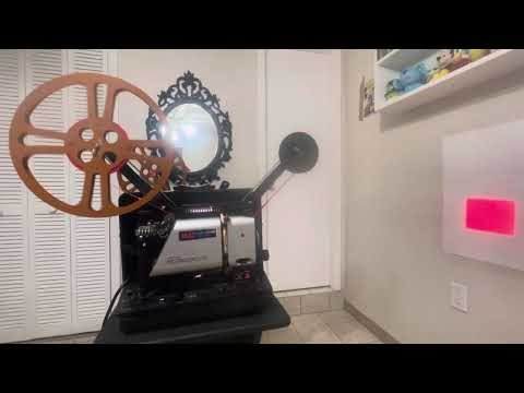 My Singer Instaload XL 2220 16mm Sound Projector running a 16mm film (Too Bright)