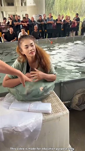 Girl Steals Fish In Public Pool