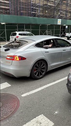 CRAZY Tesla with gasoline generator!