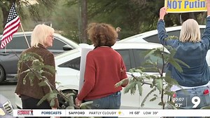 Protesters gather at Davis Monthan Air Force Base against Trump in Venezuela