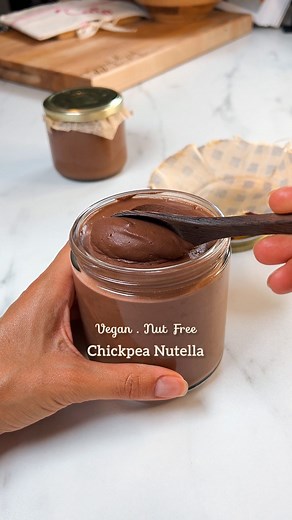 Tatyana Figueiredo 🌱 on Instagram: "Chocolate lovers ⚠️ I made my Chickpea Nutella! A great alternative if you are allergic to nuts. Just make sure to use a vegan milk that doesn’t have nuts in it. I love using homemade milk because it’s creamier but store bought is fine. This recipe is amazing hot or cold 🤤🍫 🍯 CHICKPEA NUTELLA: 🍯1 can (1 1/2 cup) chickpea, drained 🍯1 1/2 cup vegan milk (I use homemade) 🍯1 cup vegan chocolate chips 🍯5 medjool dates or to taste 🍯1 Tbsp maple syrup or to