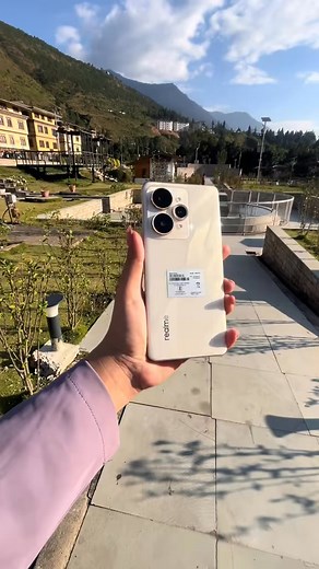 Realme 15pro. “The Realme 15 Pro features a 6.7-inch Super AMOLED 120Hz display, a Snapdragon 7 Gen 4 processor, and a triple 50MP rear camera setup. It is expected to have a large 7000 mAh battery, 32MP front camera, and come with Android 15, realme UI 6 out of the box.” #reelsfypシ #bhutanese #wangduephodrang #fyp | Sharma’s Gallery Bajo