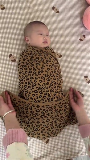 Unveiling the First Touch: Baby's First Contact with a Bag Sheet