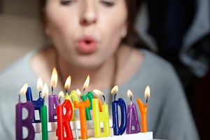 Why do people think it's bad luck not to blow out all the birthday candles in one breath?