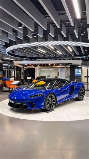 McLaren Bahrain | Experience the perfect balance of everyday luxury and supercar performance with the McLaren GTS. Aurora Blue exterior, Vintage Tan... | Instagram