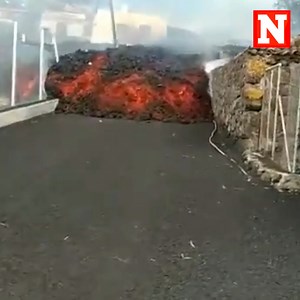 Unbelievable video shows a river of lava oozing down a street in La Palma, one of Spain’s Canary Islands after a volcano erupted on the island the day before. The lava traveled across the area at 2,300 feet per hour. The head of the regional government said that 5,000 people have been evacuated and expect no injuries to people in the area. At least 100 houses have been destroyed, according to Europa Press. No further evacuations are expected as experts warn that the lava's spread could last from