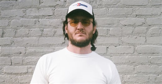 Dougie Poole shares new song “The Rainbow Wheel of Death”