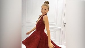 Victoria Swarovski dances during a fitting with Michael Cinco