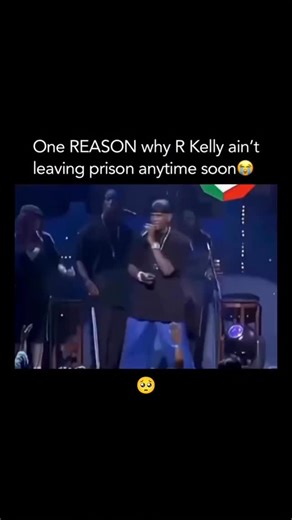 Lyrical Life 🎵 on Instagram: "Better keep him in 😭 In this video, we see a high-energy stage performance where the artist is truly in his element, engaging the crowd with a unique blend of music and showmanship. He is performing a medley that includes his smooth R&B hits, but with a creative twist—incorporating theatrical “boxing” sound effects and sharp, synchronized movements that mimic a prize fight. It’s a great example of how live concerts in the early 2000s were often treated like full B