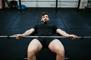 How to Do Barbell Glute Bridges (Form & Benefits)
