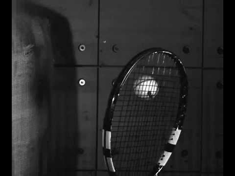 Tennis racket/ball impact under 45 degree angle in super-slow.