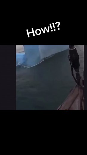 Climbing a Blue Iceberg in a Cold Polar Environment