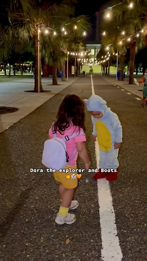 happy halloween from dora and boots 🎃 #halloween #costume #foryoupage #fyp #doratheexplorer