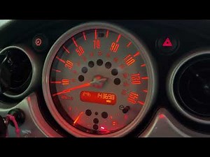 How do you set the clock on a Mini Cooper?