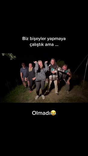 Outdoor Night Fun: Playful Dancing with Friends