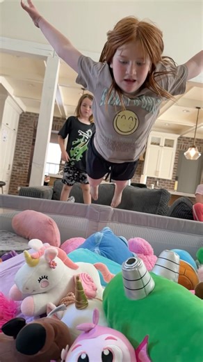 FLiPS and TRiCKS into our GiANT STUFFY SWiMMiNG POOL!!