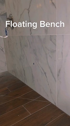 We installed this folding shower bench for our clients. #construction #homerenovation #contractor #realestate #hardwork #work #tools #bathroomrenovation #tipsandtricks #diy #tile