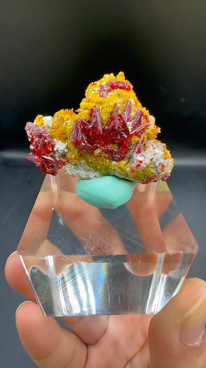 A single crystal containing orpiment, realgar, and calcite; the realgar crystal is clear and has good color. From Peru ❤️ Available for sale. | Crystal Princess