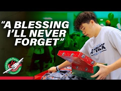 High School Football Teams Come Together To Pack Shoeboxes