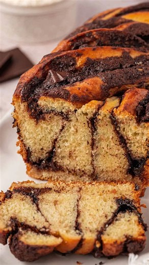 Babka but better 😝… it’s my new and improved chocolate babka recipe! This chocolate babka recipe makes two generous loaves. The recipe starts with an easy sweet dough, and rolled up with butter, chocolate and cocoa mixture. The dough is braided, baked and brushed with a simple syrup after baking. Comment RECIPE and I’ll send it to your DMs! Or find the recipe here: https://www.bostongirlbakes.com/overnight-chocolate-cinnamon-babka/ #bakingrecipe #bakingfromscratch #chocolatebabka | Boston Girl 