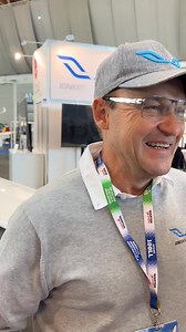 Uys Jonker engaging with one of our customers at AERO, discussing our JS products and sharing exciting news about our new factory in Potchefstroom, South Africa. | Jonker Sailplanes