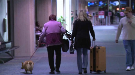 Norfolk airport travelers stay positive despite potential winter weather delays across the country this Thanksgiving weekend