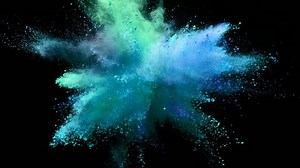 clip-1013642642-color-powder-explosion-isolated-on-black-background