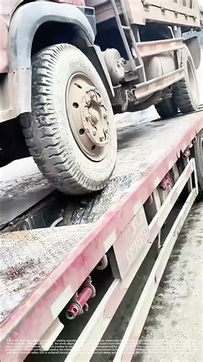 Truck on a Truck: The Precision Load of Heavy Machinery