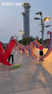 Ribbon dragon dancing has grown increasingly popular among Chinese seniors, prized for its graceful movements and full-body workout. Watch the colorful ribbon dragons dance at Beijing's Olympic Park! | VideoChina