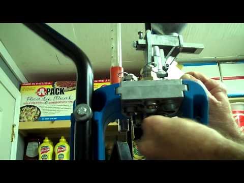 DILLON XL 650 CALIBER CHANGE PT 3 ADJUSTING THE POWDER MEASURER AND LOADING 357 MAGNUM.