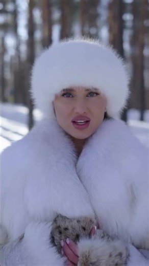 RUSSIAN BEAUTY IN A FOX FUR COAT IN THE COLD SIBERIAN WINTER
