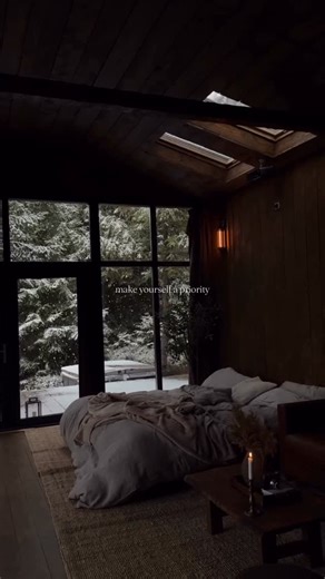 Romania on Instagram: "What do we keep? A cabin folded into the woods, snow descending like a forgotten language relearned slowly, the stove exhaling heat as if it remembers older winters than we do. Through the broad windows, the forest is rewritten flake by flake, not erased but softened, edges dulled into mercy. This is winter as Romania understands it, austere, intimate, uninterested in entertaining anyone. Meaning settles here the way ash settles after a long burn. Time feels negotiable, al